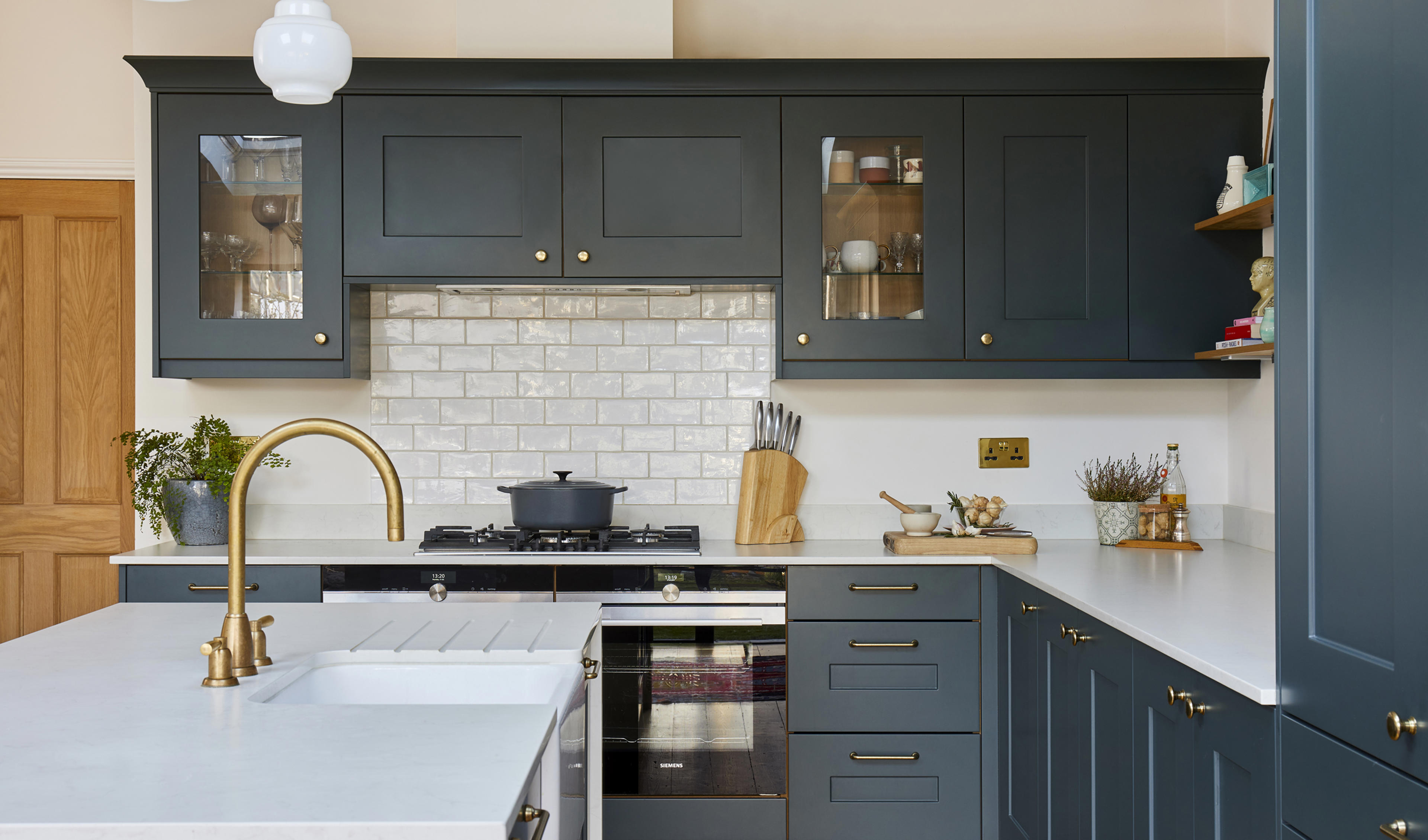 One of the biggest trends in kitchen design is to add metallic touches to your kitchen with hardware, accessories and small appliances.