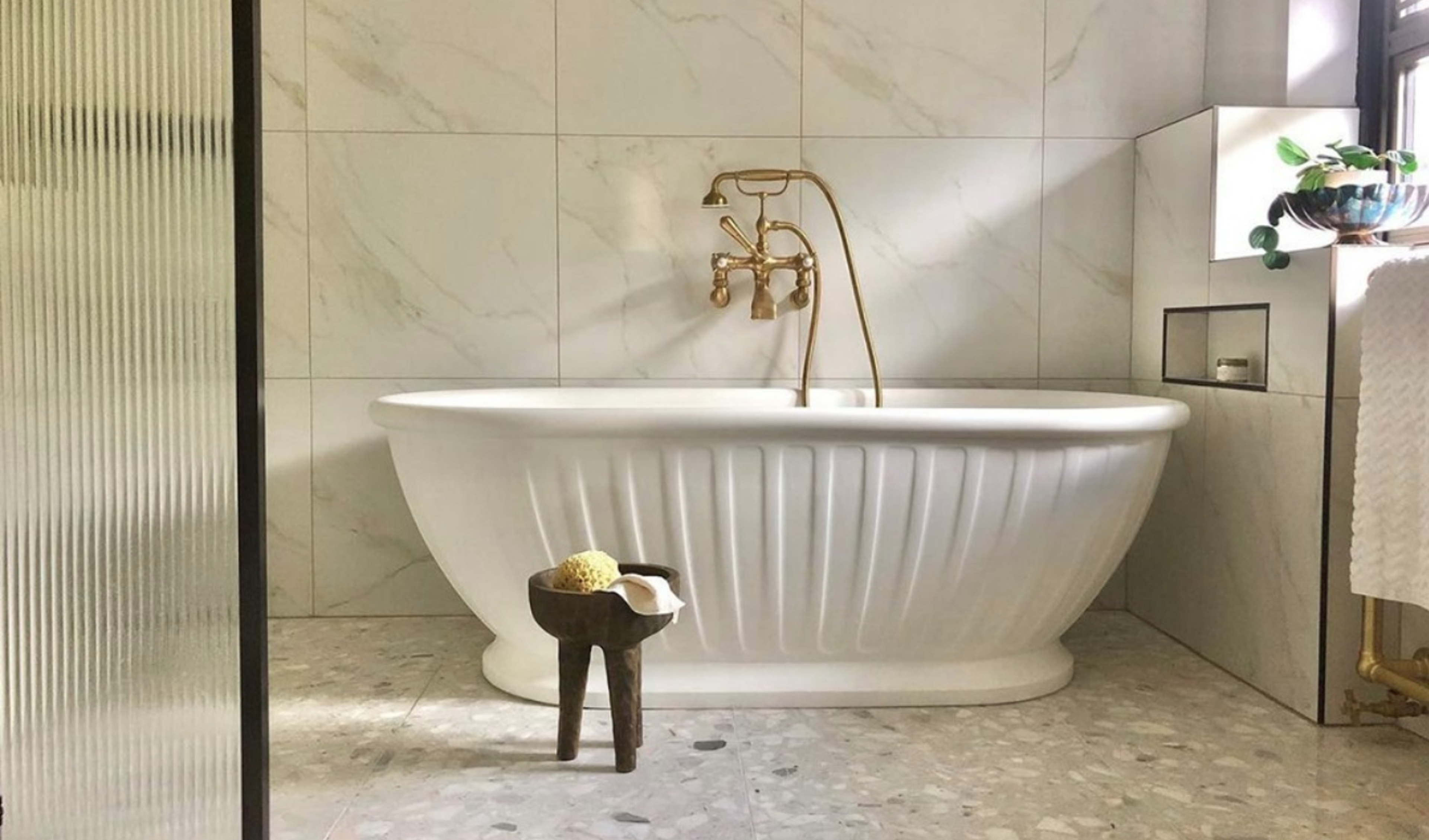 Bathrooms are always a joy to design. I love working with tiles and all the different artisan options that are now available, and then pairing these with beautiful brassware pieces - both vintage with contemporary. I feel this gives the space a real feeling of personality and depth.