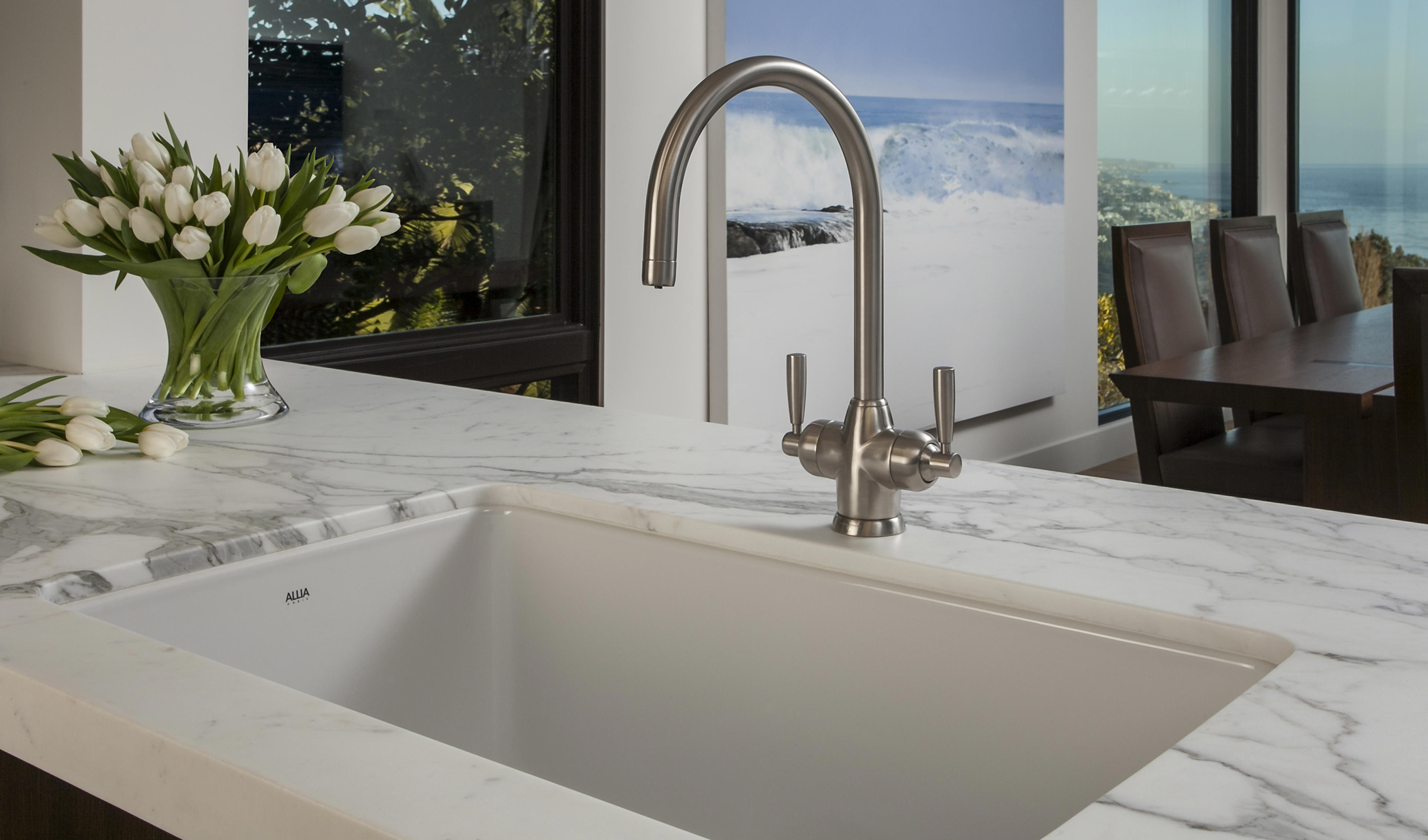 For a modern look, perfect for sleek undermounted and integrated sinks, our Mimas filtration tap is a simple dual lever design with curvaceous C spout.